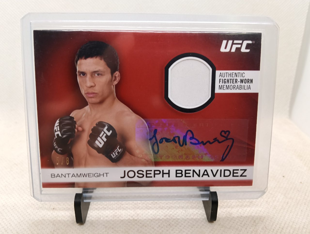 Joseph Benavidez 2012 Topps UFC Knockout Autographed Fighter Gear Red #/8 #AFG-JB — 2012 · 2012 Topps UFC Knockout · Joseph Benavidez · Autographed Fighter Gear Red · autograph · raw
