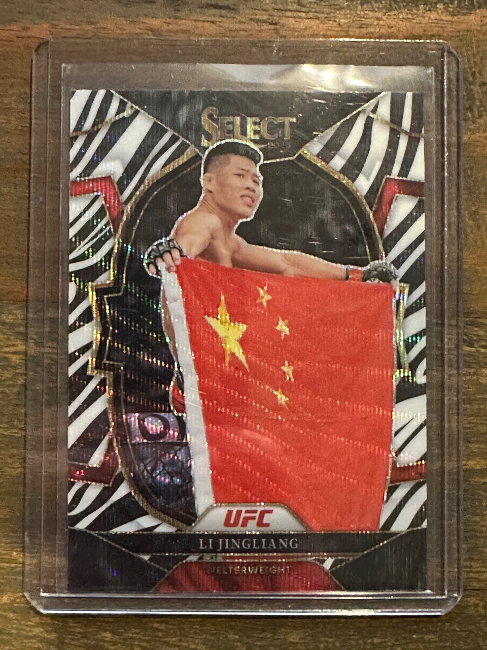Li Jingliang 2023 Panini Select UFC Concourse Zebra Prizm #19 — 2023 · 2023 Panini Select UFC · Li Jingliang · Concourse Zebra Prizm · raw