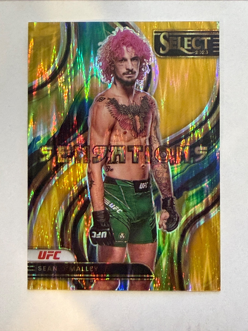 Sean O'Malley 2023 Panini Select UFC SENSATIONS Gold Flash Prizm /10 #15 — 2023 · 2023 Panini Select UFC · Sean O'Malley · SENSATIONS Gold Flash Prizm · raw