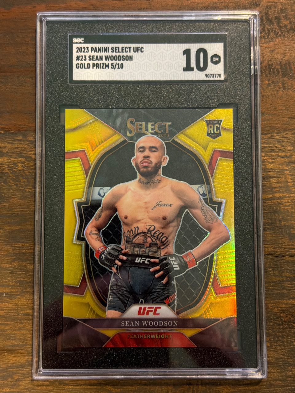 SEAN WOODSON RC 2023 Panini Select UFC Gold Prizm /10 #23 — 2023 · 2023 Panini Select UFC · Sean Woodson · Gold Prizm · SGC 10