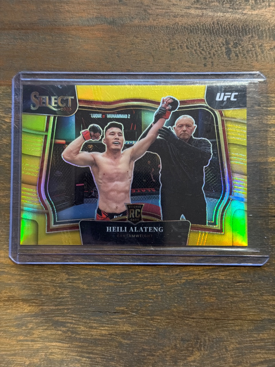 HEILI ALATENG RC 2023 Panini Select UFC Octagonside Gold Prizm /10 #202 — 2023 · 2023 Panini Select UFC · Heili Alateng · Octagonside Gold Prizm · raw