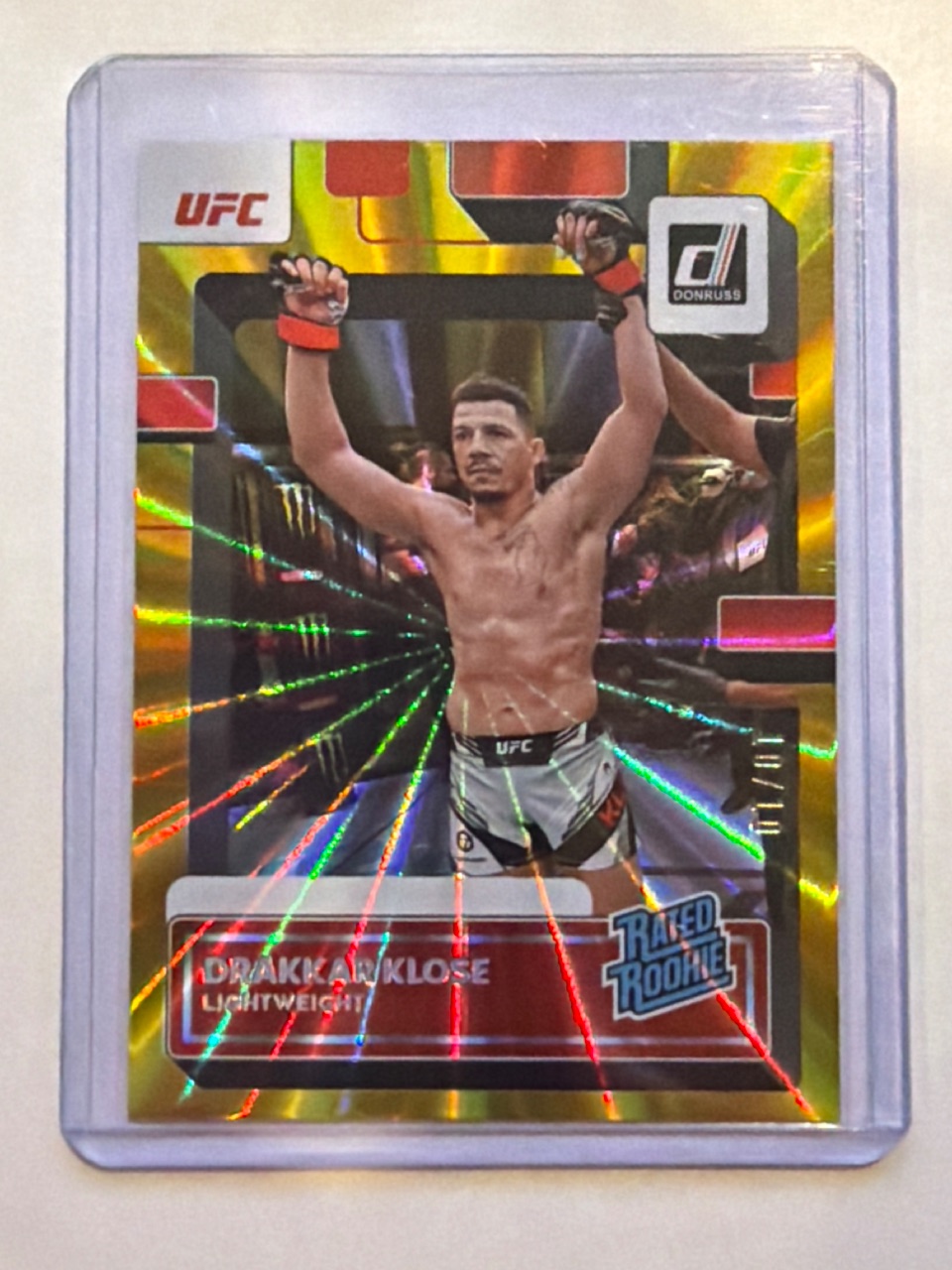 DRAKKAR KLOSE RC 2023 Panini Donruss UFC Rated Rookie Gold Laser Holo /10 #207 LOP — 2023 · 2023 Panini Donruss UFC · Drakkar Klose · Rated Rookie Gold Laser Holo · raw